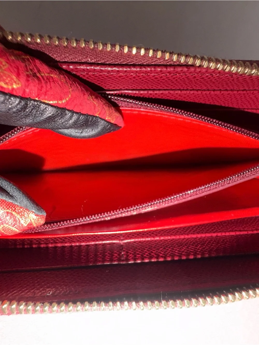 Dooney & Bourke Wine Textured Zip Wallet with Gold Plaque